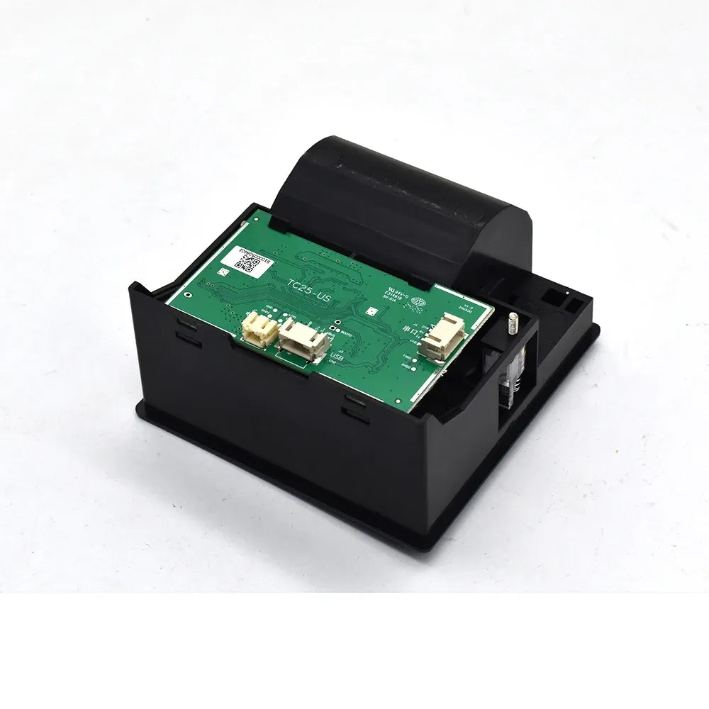Black thermal printer module opened to reveal green circuit board and connectors
