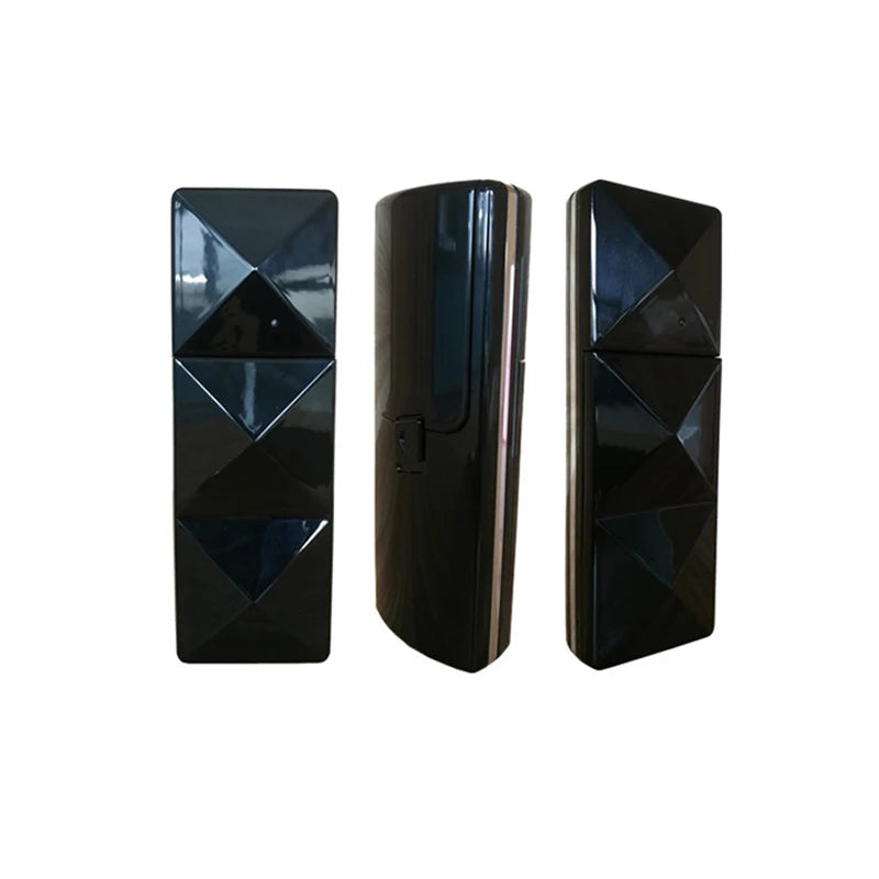 Black portable nano facial steamer for hydrating, pore cleaning, and eyelash extensions in a sleek geometric design.