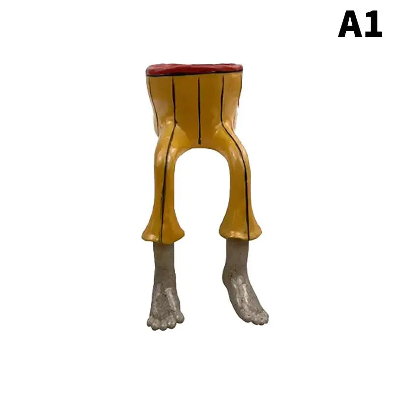 Gold leggy resin planter with red-brown rim and standing gray legs