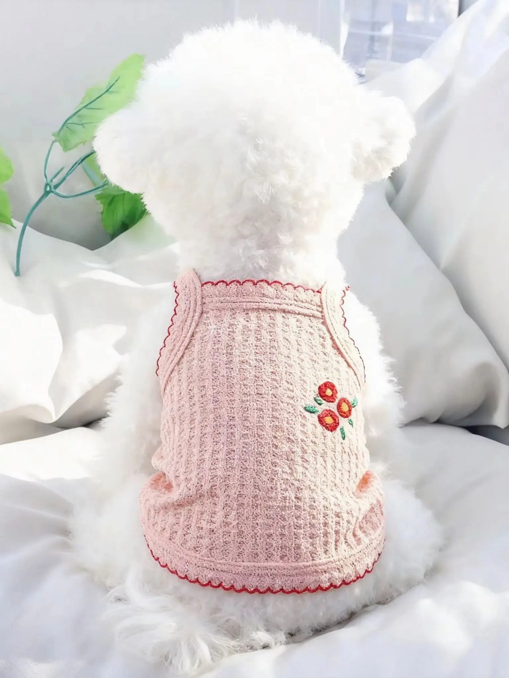 Small dog wearing a soft, breathable pink floral tank top for summer, perfect for Bichons and Yorkshire Terriers.