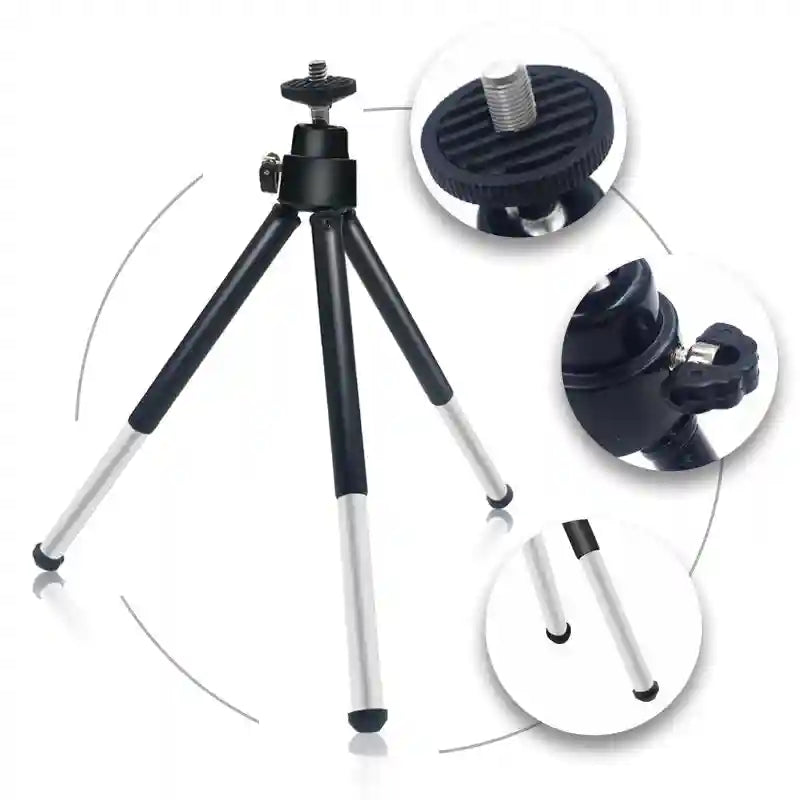 Small black and silver tabletop tripod with three telescoping legs and a threaded screw mount for cameras or phones.