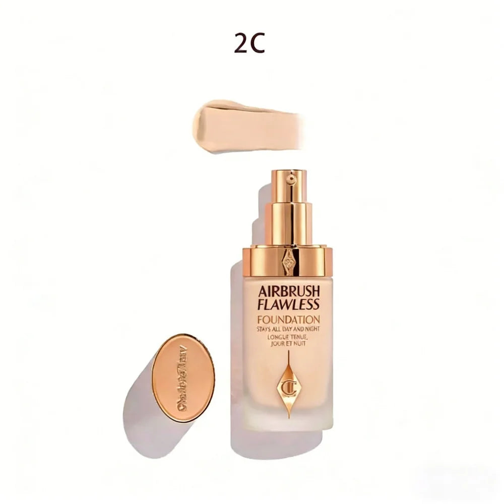 Charlotte Tilbury Airbrush Flawless Foundation in shade 2C, liquid formula texture with a sleek gold pump bottle.