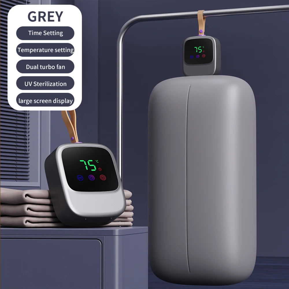 Tidesmit folding electric clothes dryer with UV sterilization for portable laundry drying, side angle view.