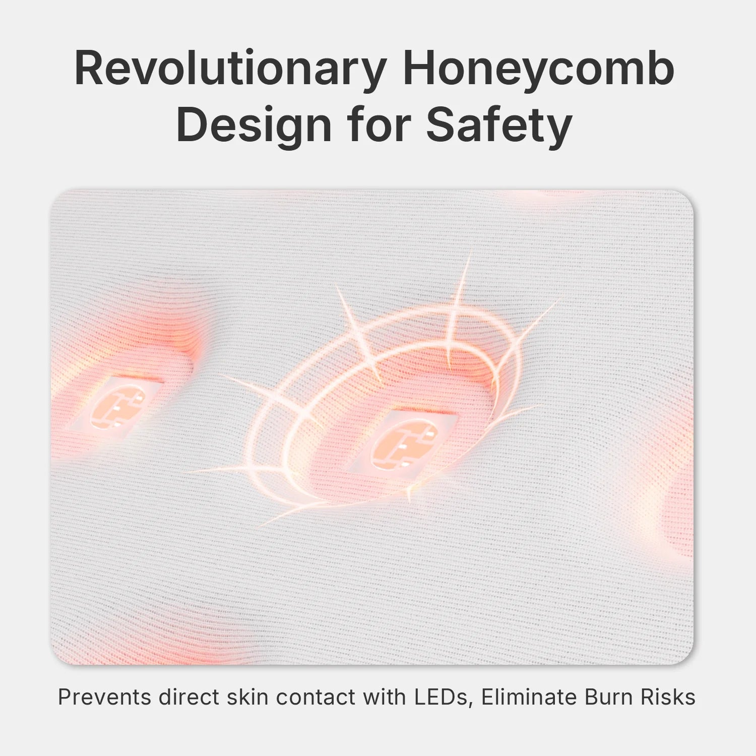 Close-up of a white, textured red light therapy mat featuring a honeycomb pattern protecting recessed LED lights.