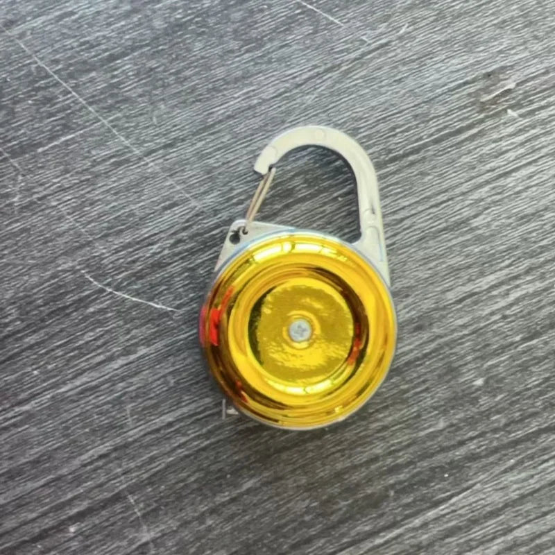 Yellow round bubble vial level tool with arched handle and metallic base