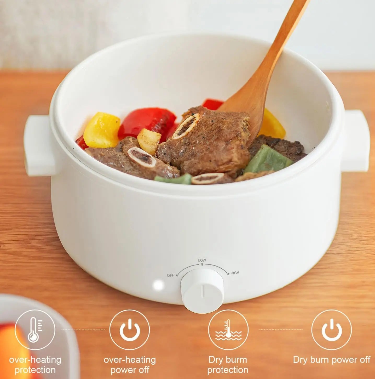 3L electric hot pot with ceramic non-stick bowl, visible knob and handles, filled with stew