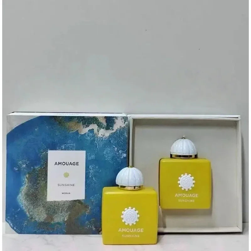 Amouage Sunshine Woman EDP: Luxury yellow square glass bottle with domed cap, Arabian floral perfume for women.