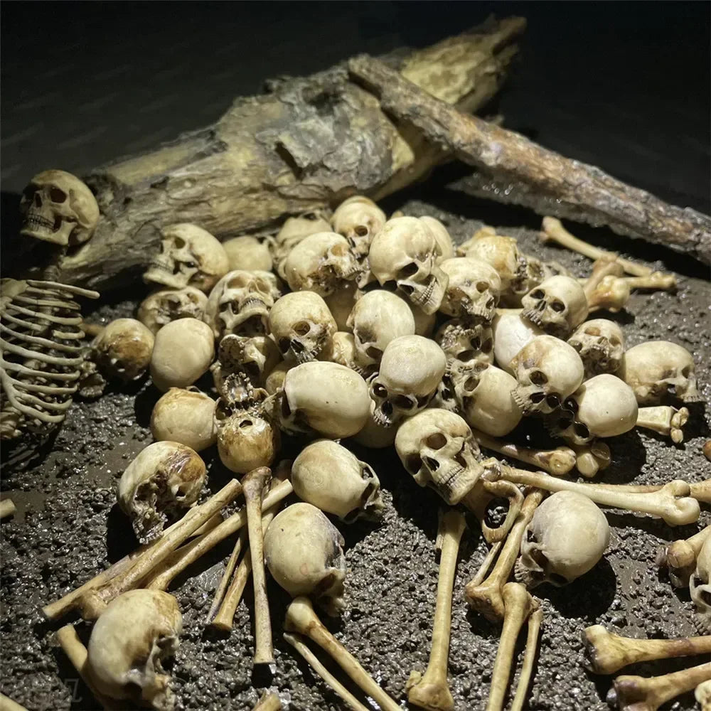 Miniature faux skeleton bone pile decoration for reptile tanks, terrariums, and creepy aquarium scaping.