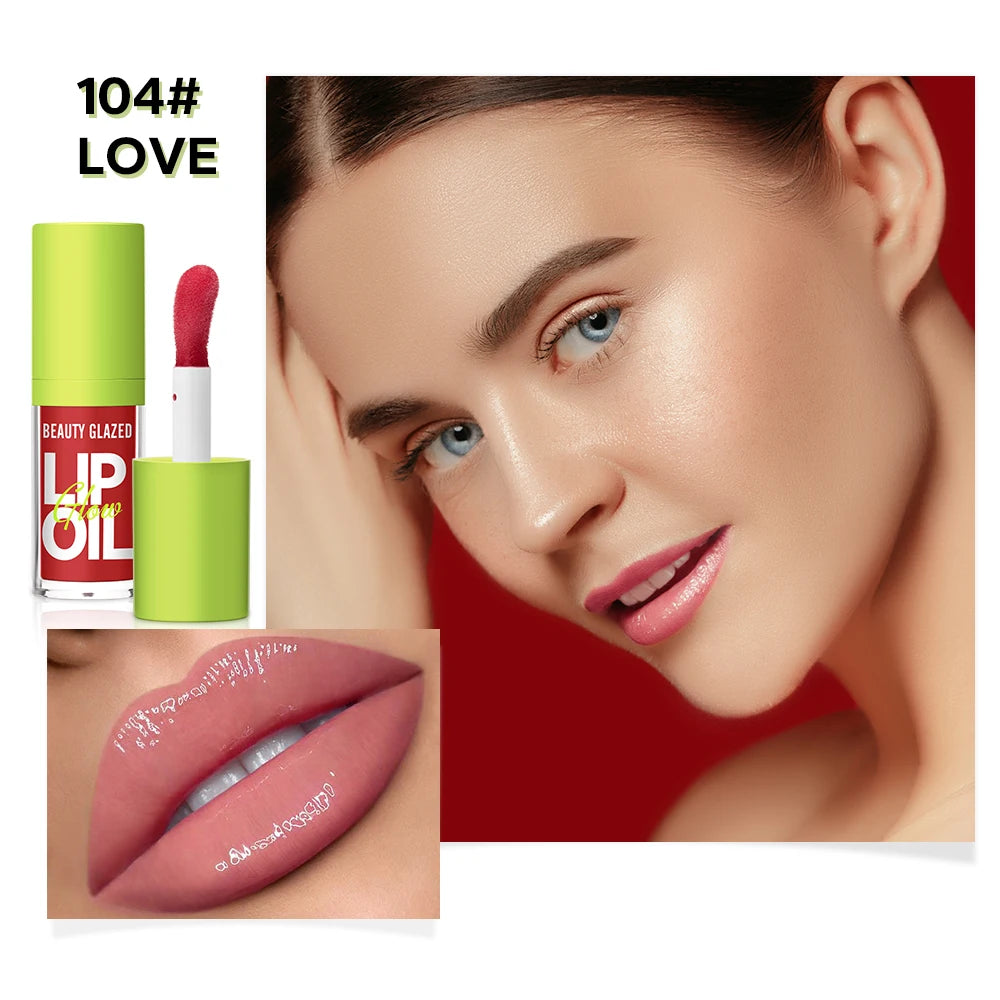 Moisturizing candy lip oil in shade 104 Love, offering a lustrous, mirror-like nude finish for hydrated, natural lips.