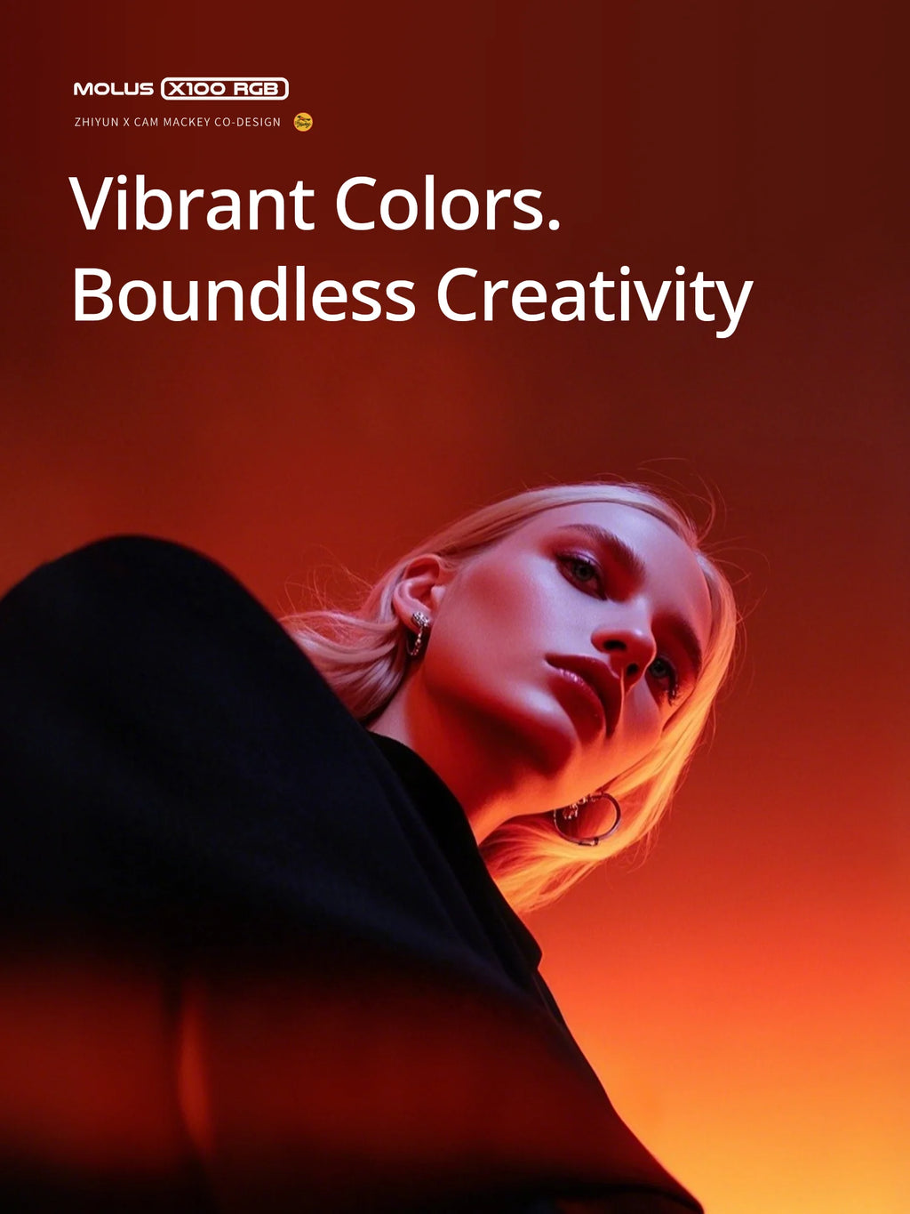 Molus X100 RGB portable pocket light providing creative, vibrant red and orange studio lighting for portrait