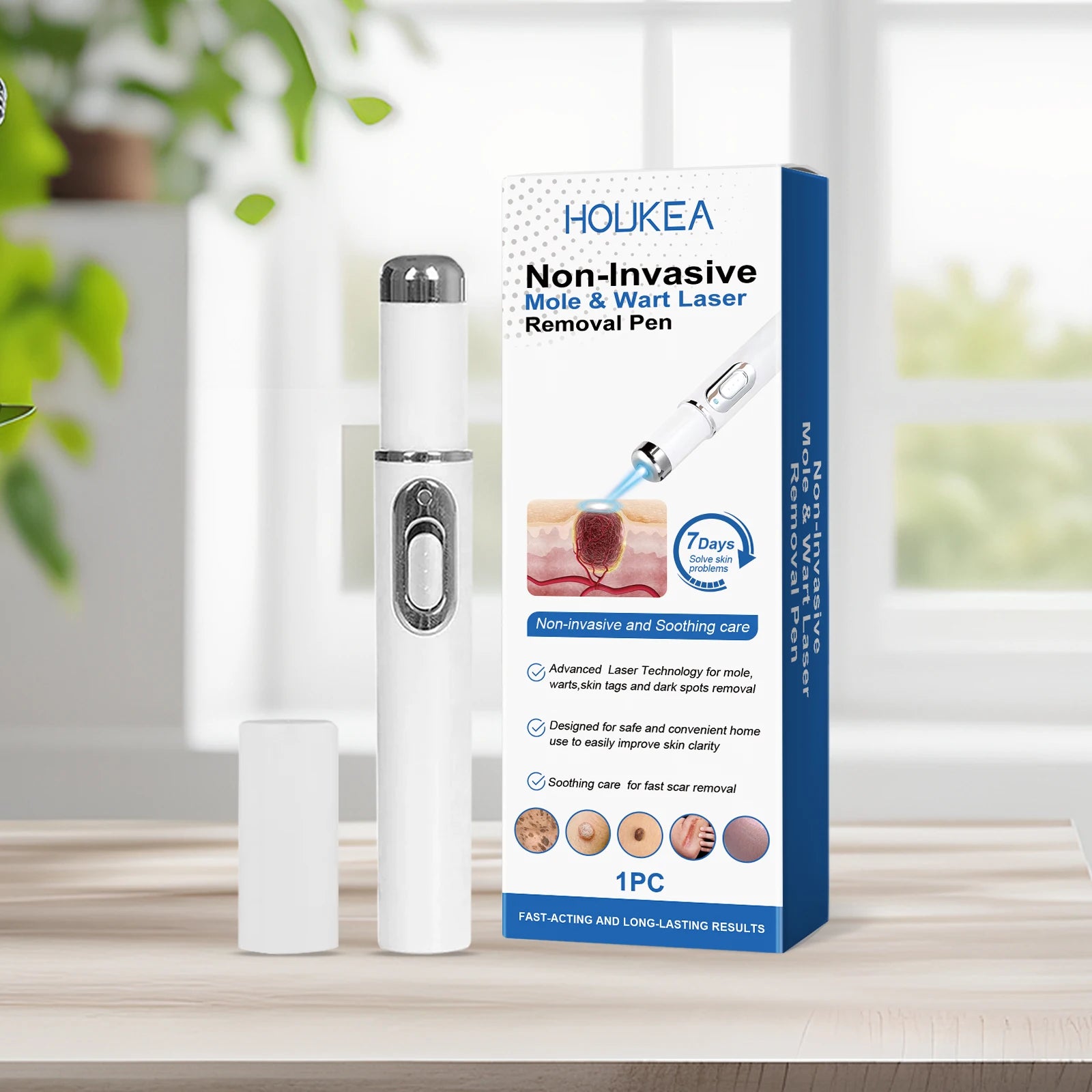 White and silver handheld blue light therapy pen for wart and mole removal, standing next to its product box.