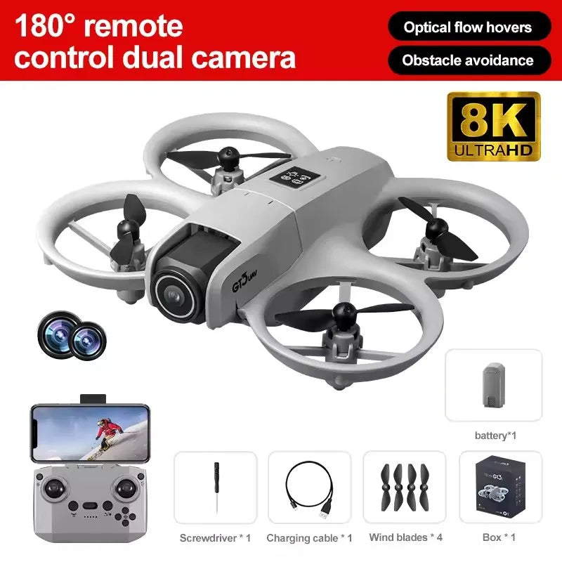 Grey 8K dual-camera drone with propeller guards, remote control, spare blades, battery, and charging cable.
