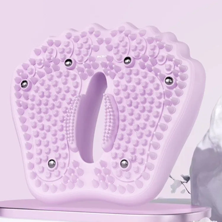 A light purple foot-shaped massage mat with acupoint nubs and silver magnetic spheres on a light pink stand.