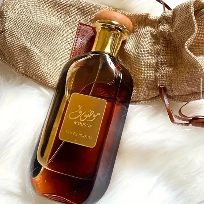 Mousuf Intense Arabian unisex EDP perfume in a rectangular glass bottle with gold cap, long-lasting musk fragrance.