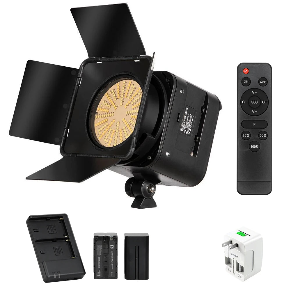 Black LED video light with barn doors, remote control, two batteries, dual charger, and universal power adapter.
