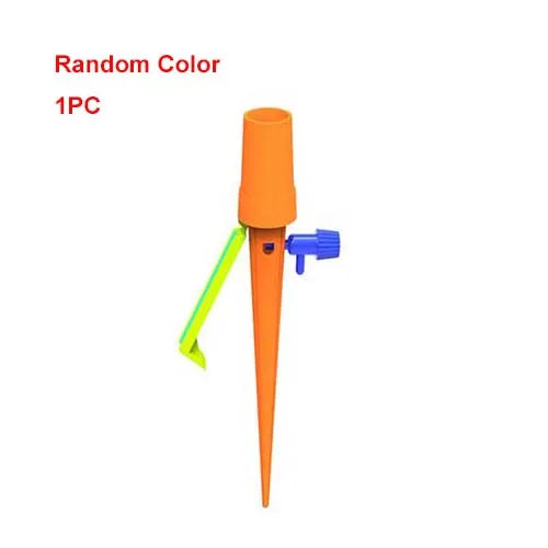 One auto drip irrigation spike in orange and green with blue flow control