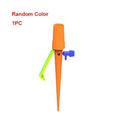 One auto drip irrigation spike in orange and green with blue flow control