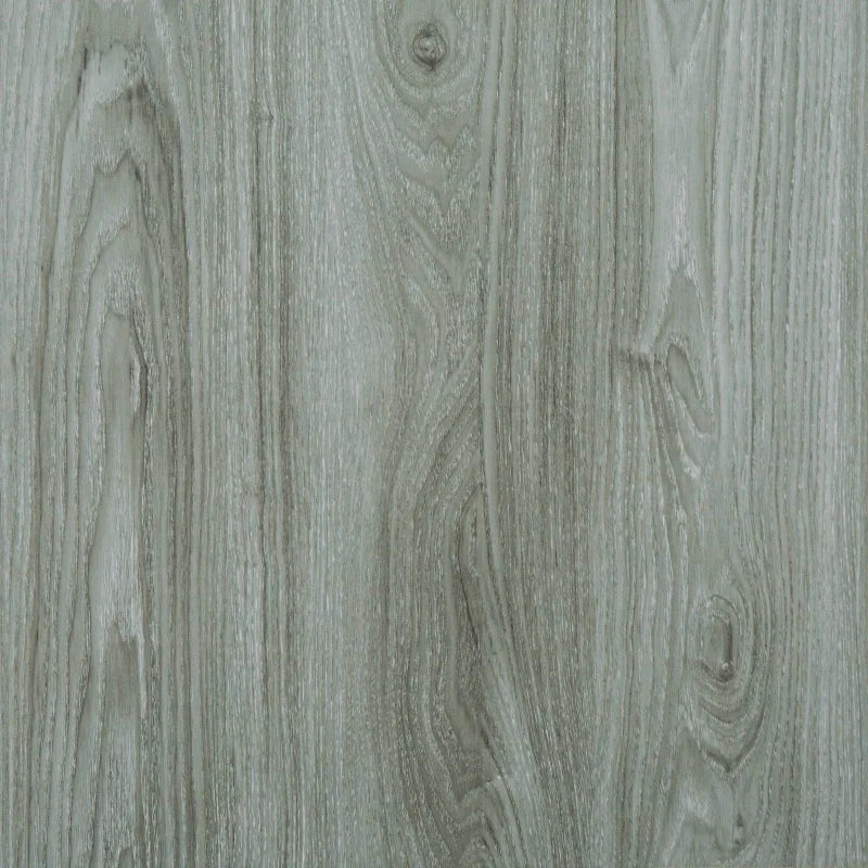 Self-adhesive vinyl floor tile with pale sage green wood grain pattern, flat finish