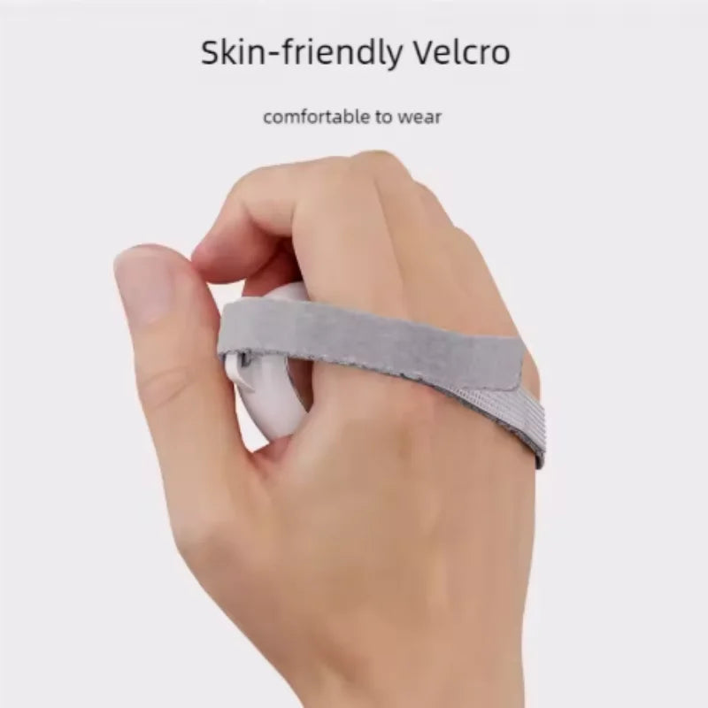 White microcurrent sleep aid device with skin-friendly velcro strap worn on hand for anxiety and insomnia relief.