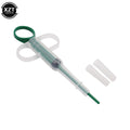 Green plastic pet pill dispenser and medicine syringe for easy tablet or liquid feeding for dogs and cats.