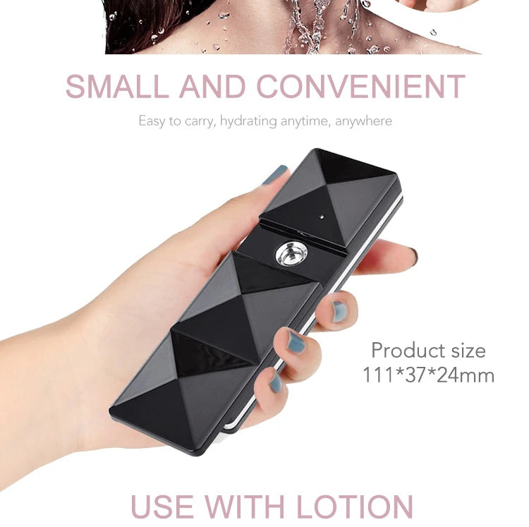 Handheld black portable nano facial steamer for hydrating mist, pore cleaning, and lash extensions. USB rechargeable.