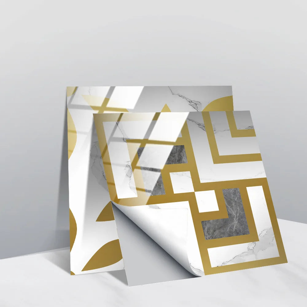 Faux marble tile wall sticker sheets with gold geometric accents on white and gray stone texture