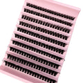 Tray of black, synthetic individual eyelash extensions arranged in rows on a pale pink base for professional