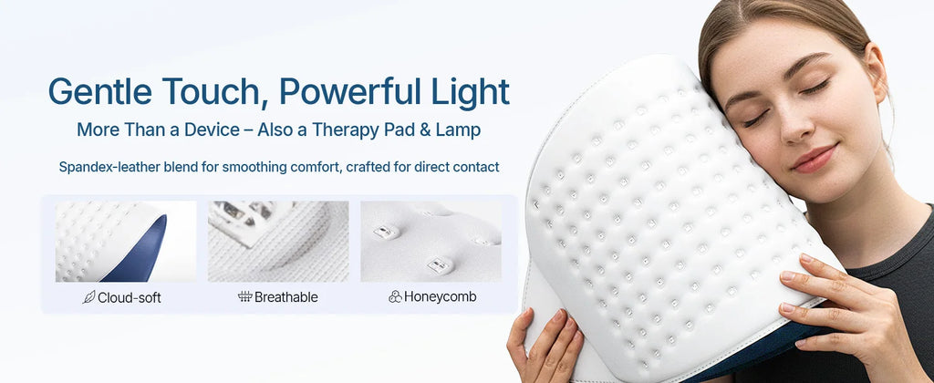 A woman rests her face on a white, soft, flexible red light therapy mask with a honeycomb LED panel design.