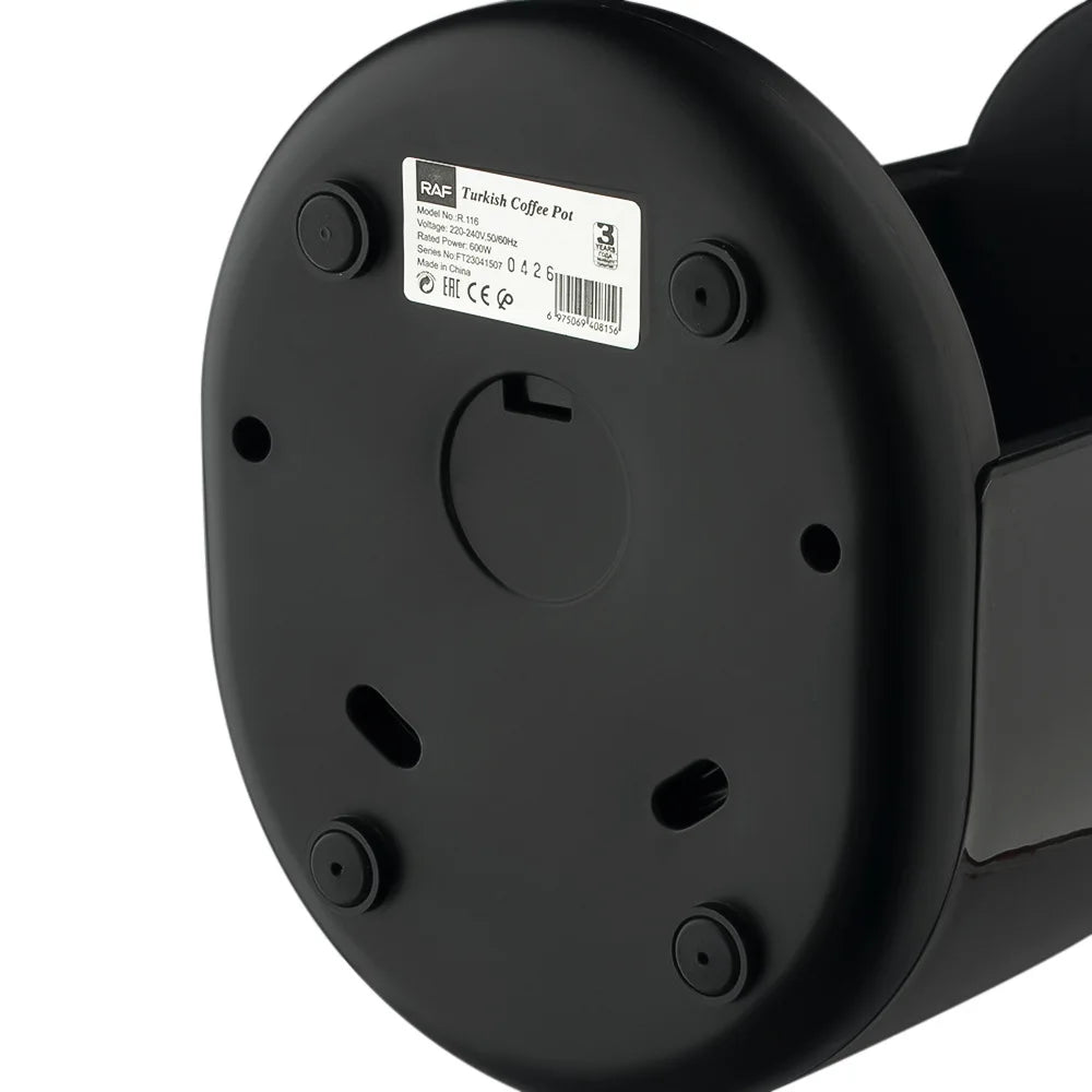 Underside of black RAF electric Turkish coffee pot, model R.116, showing label, rubber feet, and 600W power details.