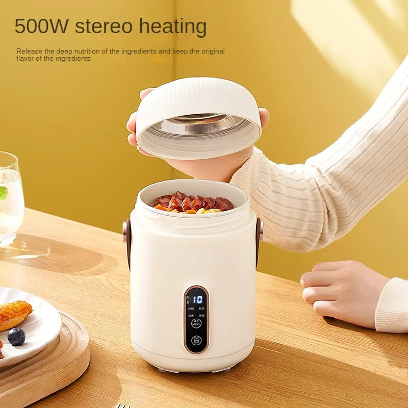 White electric stewing cup slow cooker with lid open showing inner pot