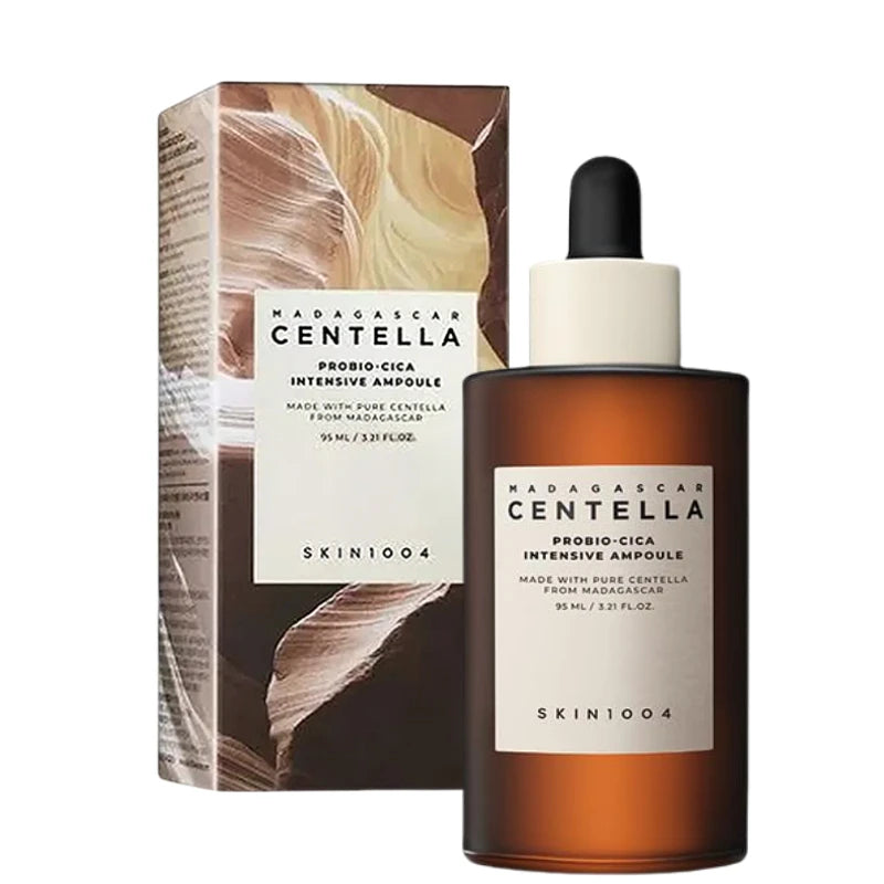 Face ampoule serum bottle with dropper, amber glass and black cap; boxed