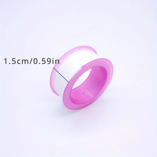 Pink pipe sealing tape roll with light pink outer ring, coiled white strip