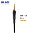Dental composite placement instrument with a black handle and a 3mm gold-colored curved tip.