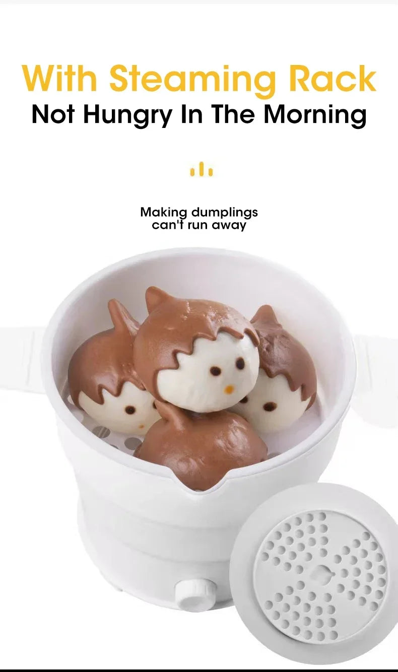 Portable folding electric hot pot with steaming rack insert, white, with food inside.
