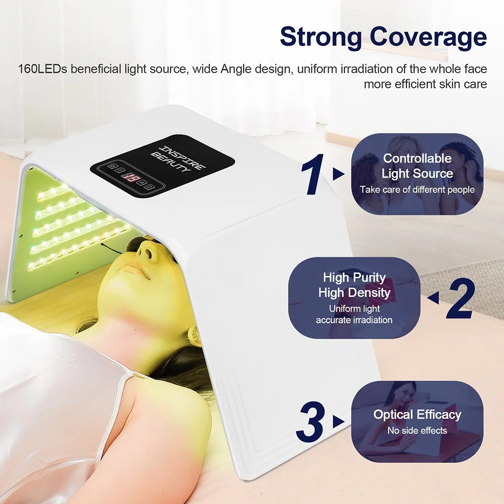 White arched LED light therapy machine with a digital control panel, placed over a person's face for skincare.
