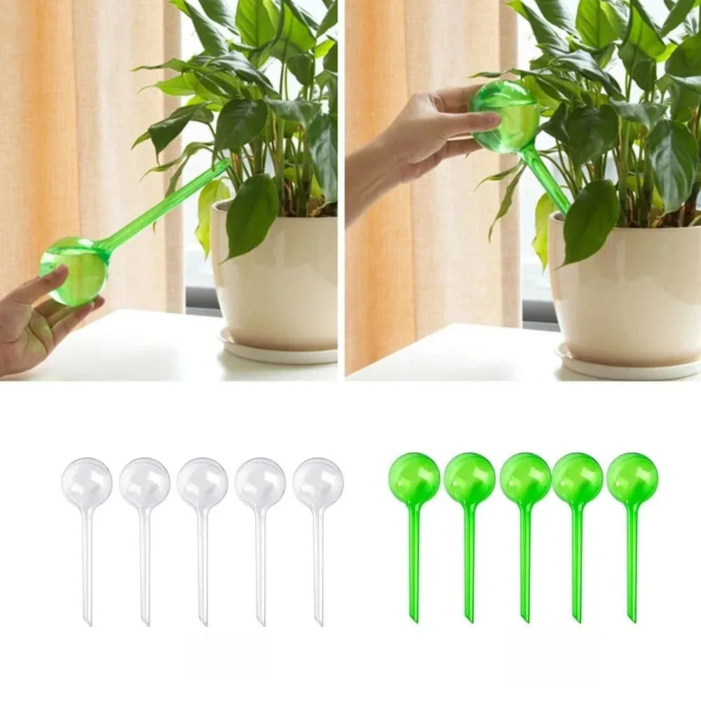 Transparent and green watering bulb set with globe tops and long spikes