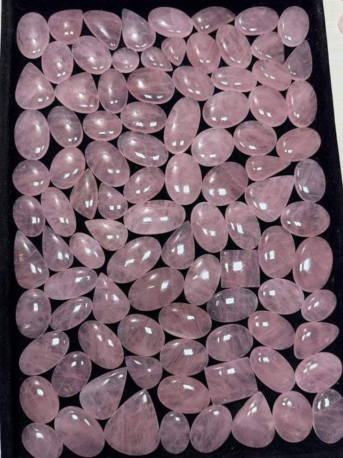 Loose rose quartz cabochon stones, pale pink oval and teardrop shapes with glossy polish