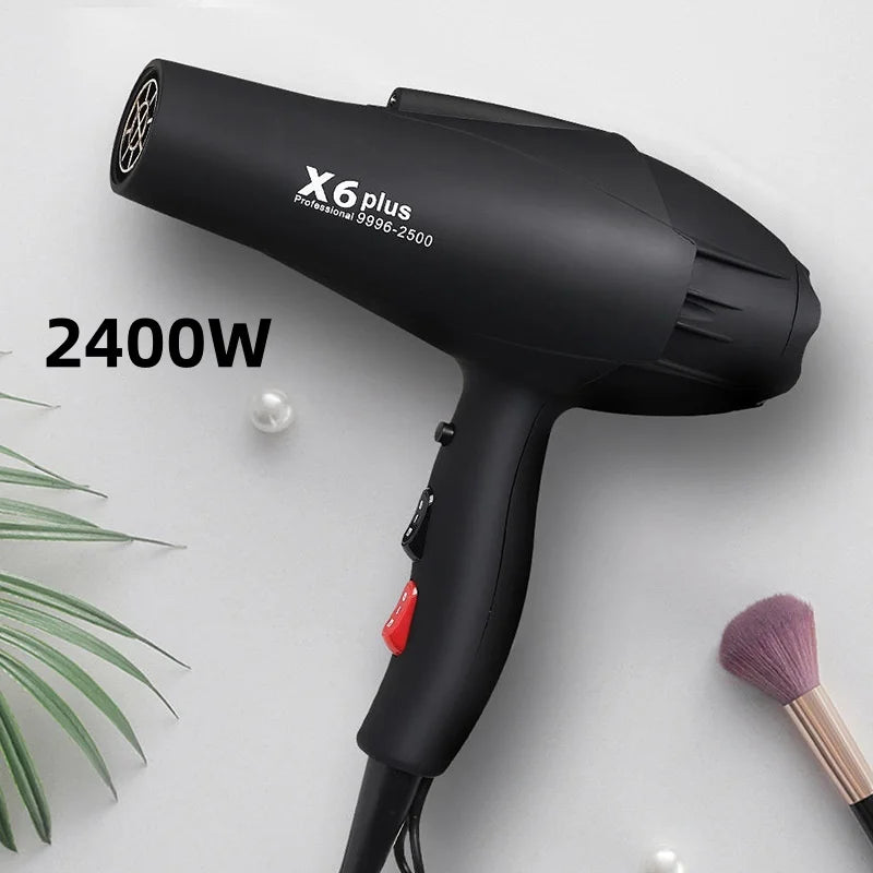 Matte black X6 Plus 2400W professional hair dryer with high-power airflow for salon-quality styling at home.