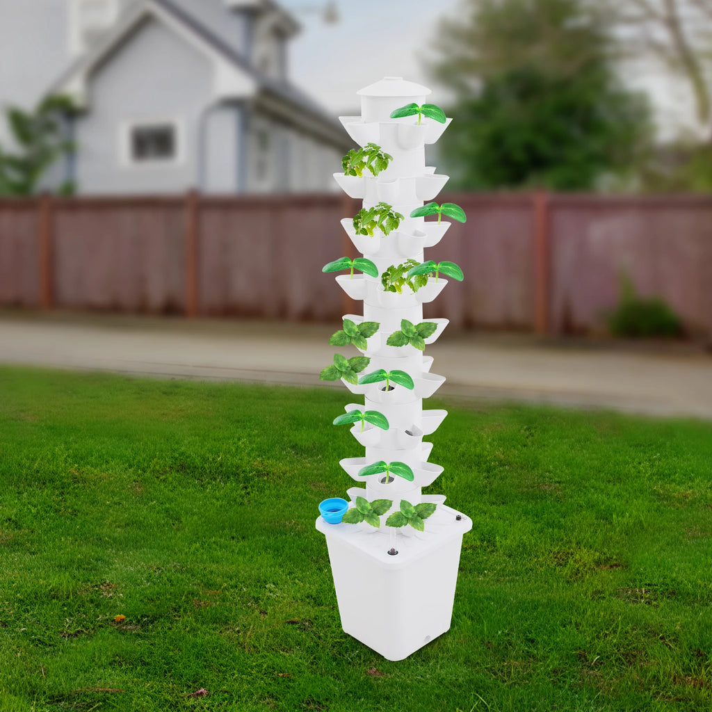 White vertical hydroponic planter tower with leafy green plants and blue water inlet