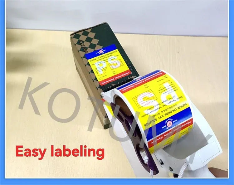 Handheld labeler applying barcode labels to a cardboard shipping box