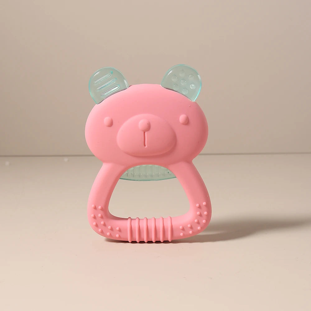 Pink bear-shaped silicone teething toy for baby teething relief with textured ears.