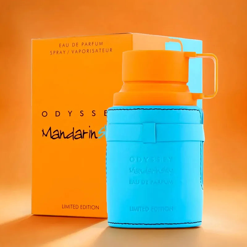 Odyssey Mandarin Sky EDP: Men’s woody aromatic perfume in a blue leather-wrapped bottle with an orange lid, 100ml.