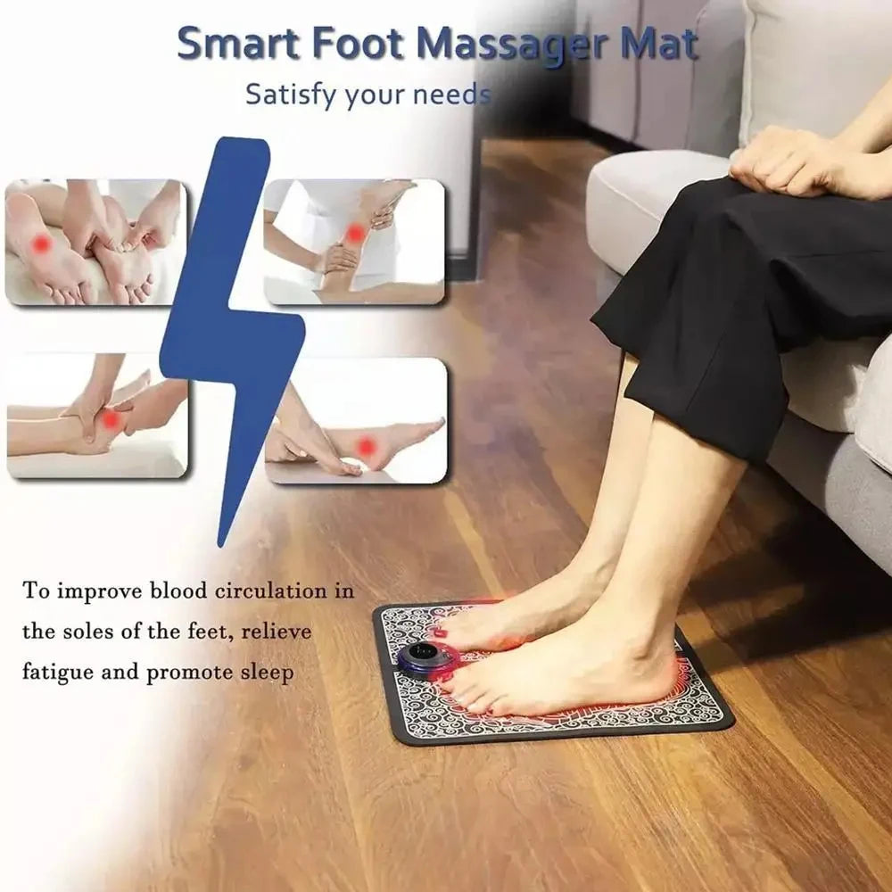 Black rechargeable EMS foot massage mat with electric control unit used at home to relieve sore feet and fatigue.