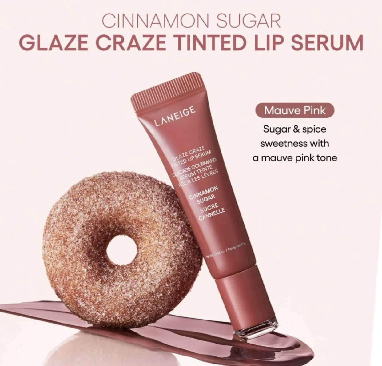 Laneige Glaze Craze Cinnamon Sugar mauve pink tinted lip serum with glossy texture next to a sugary donut.