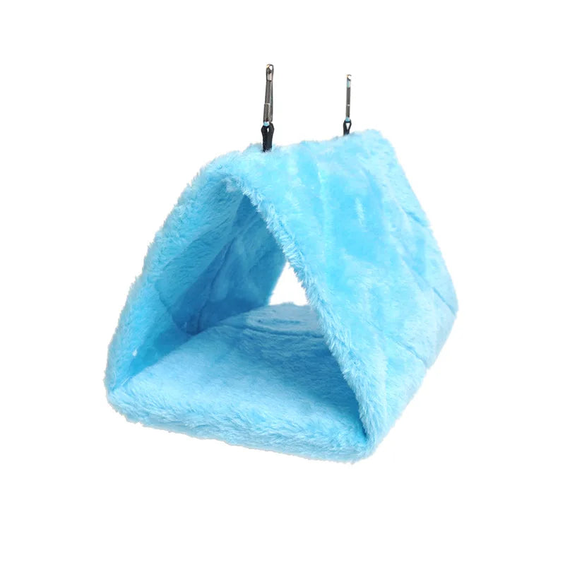 Blue plush hanging hammock bed for hamsters and birds, a cozy, warm winter nest for cages.