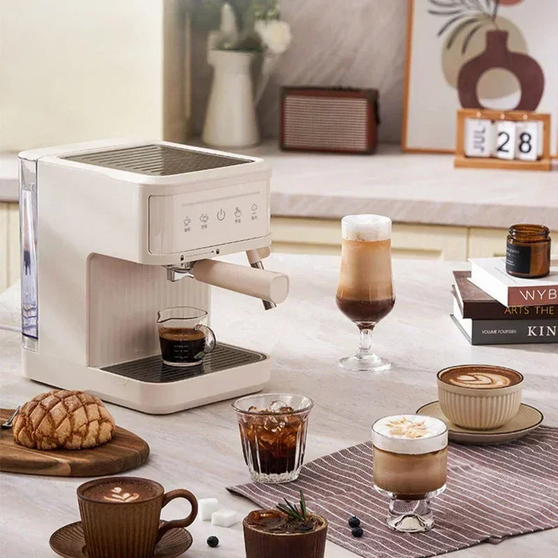 Cream-colored espresso coffee machine with a portafilter, featuring a modern, compact design on a kitchen countertop.
