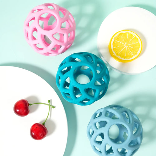 Pink, teal, and blue silicone baby teething toy balls for relief.