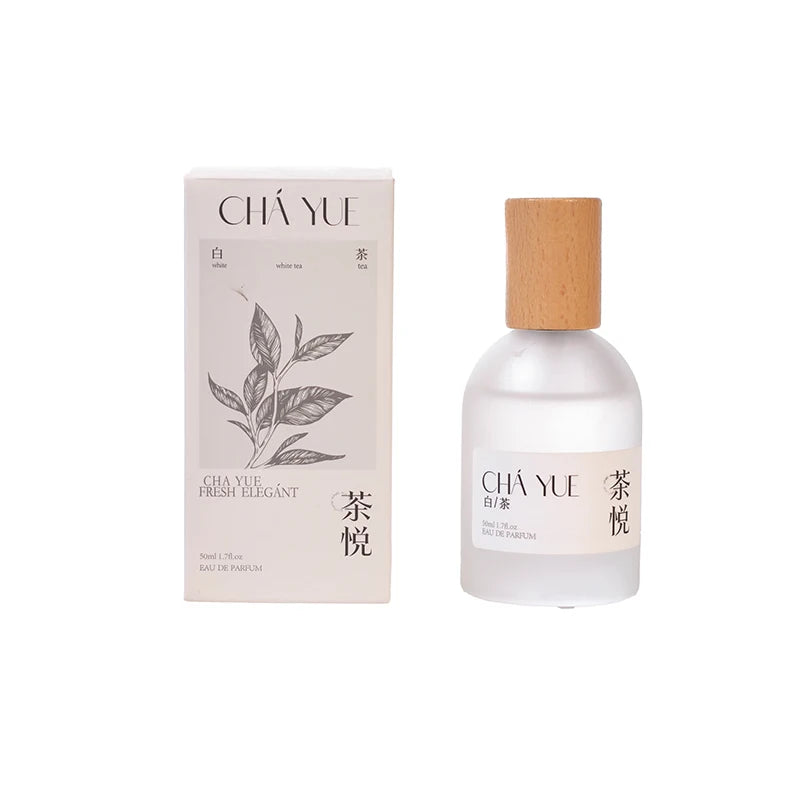 Cha Yue unisex white tea perfume with wooden cap, frosted glass bottle, and minimalist tea leaf box packaging.