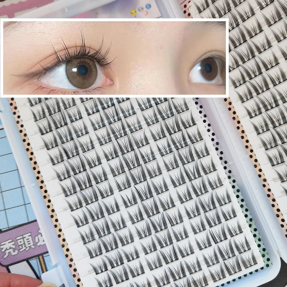 Tidesmit pointed cat-eye black false lashes in C-curl, displayed as individual clusters in a multi-pack storage tray.