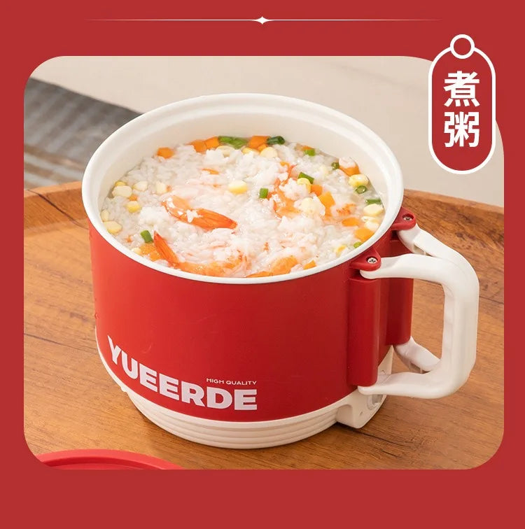 Red YUEERDE electric hot pot with mixed vegetables in clear broth inside